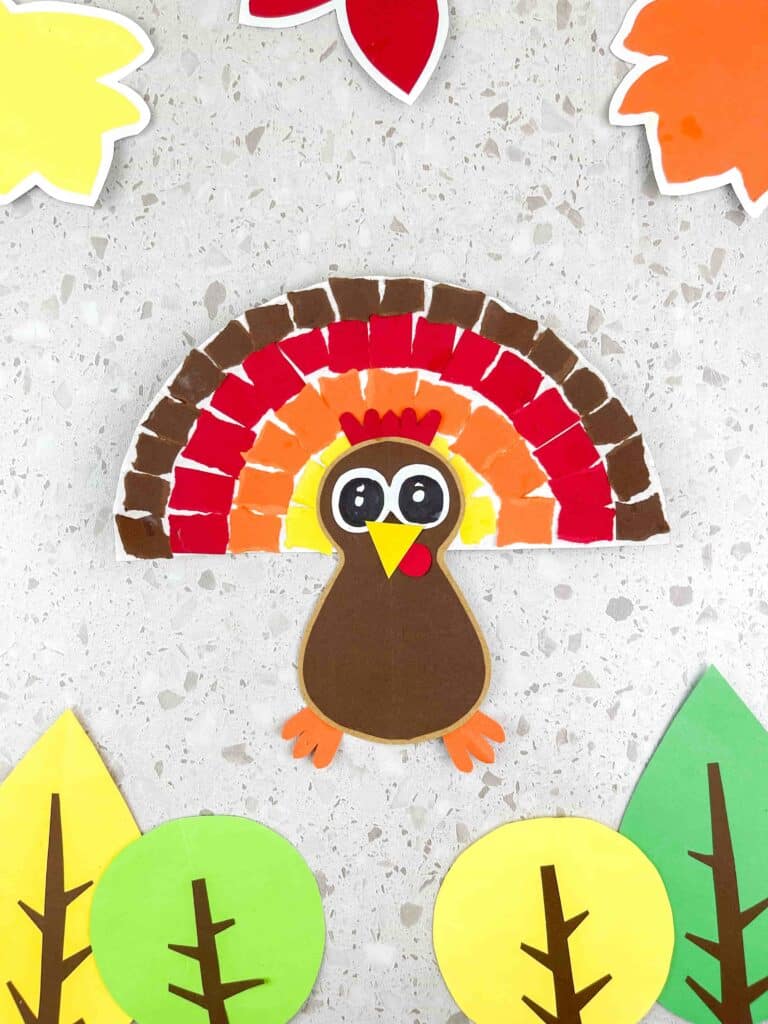 Thanksgiving Torn Paper Turkey Craft - Cultivating Brilliant Minds A turkey craft made from torn paper