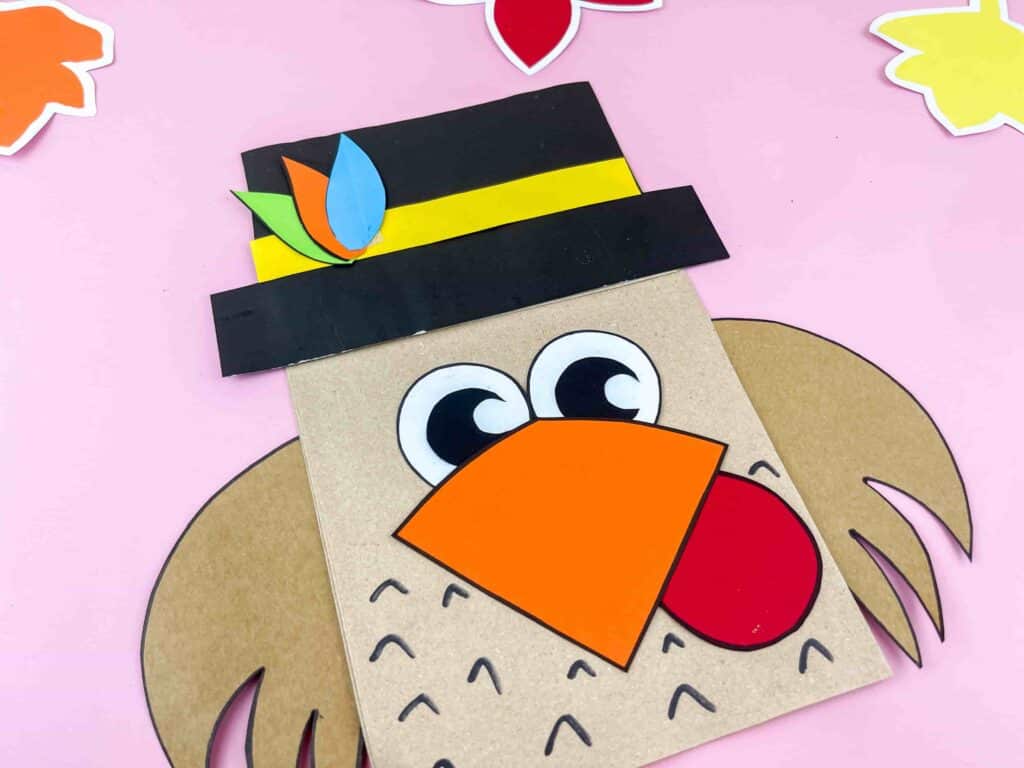 Thanksgiving Turkey Paper Bag Craft - Cultivating Brilliant Minds a paper bag decorated to look like a turkey