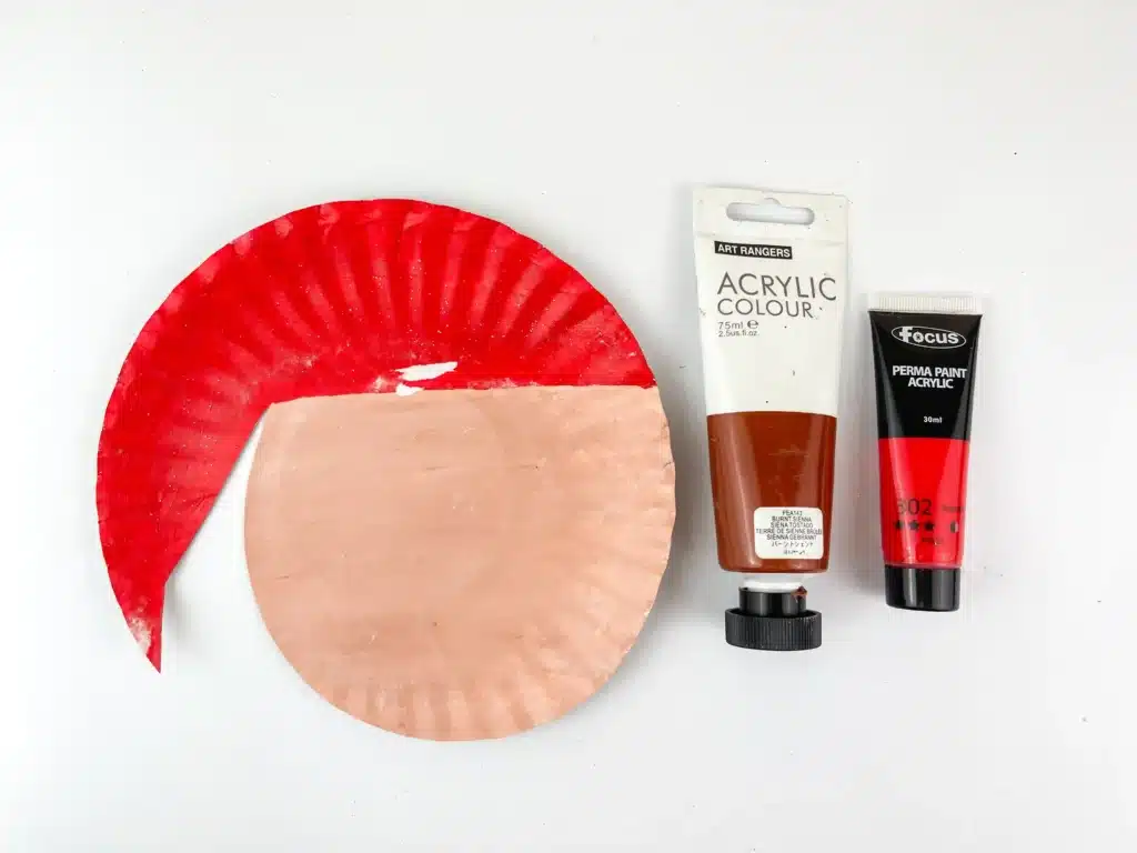 Santa Paper Plate Craft - Cultivating Brilliant Minds a paper plate cut and painted to look like santa