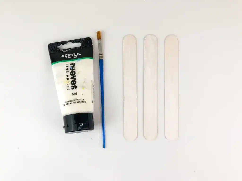 Snowman Popsicle Stick Ornament - Cultivating Brilliant Minds popsicle sticks painted white