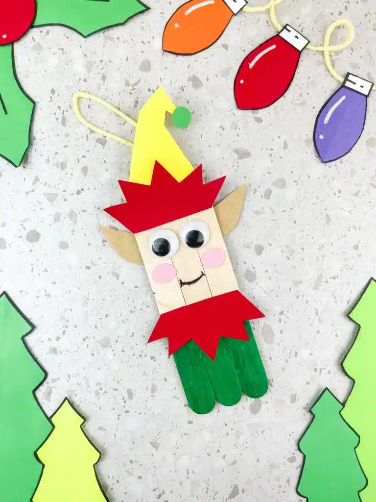 popsicle sticks decorated to look like an elf