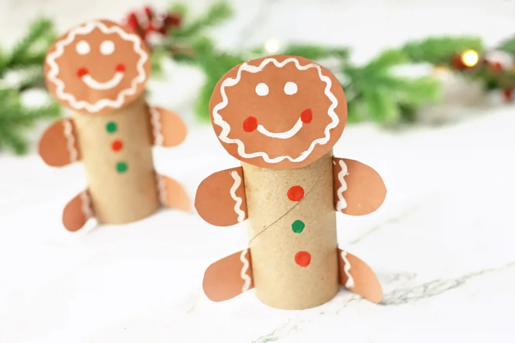 gingerbread man craft made out of a toilet paper roll