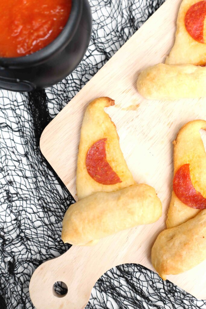 Witch Hat Pizza Snacks For Halloween - Cultivating Brilliant Minds Pizza that looks like a witch's hat