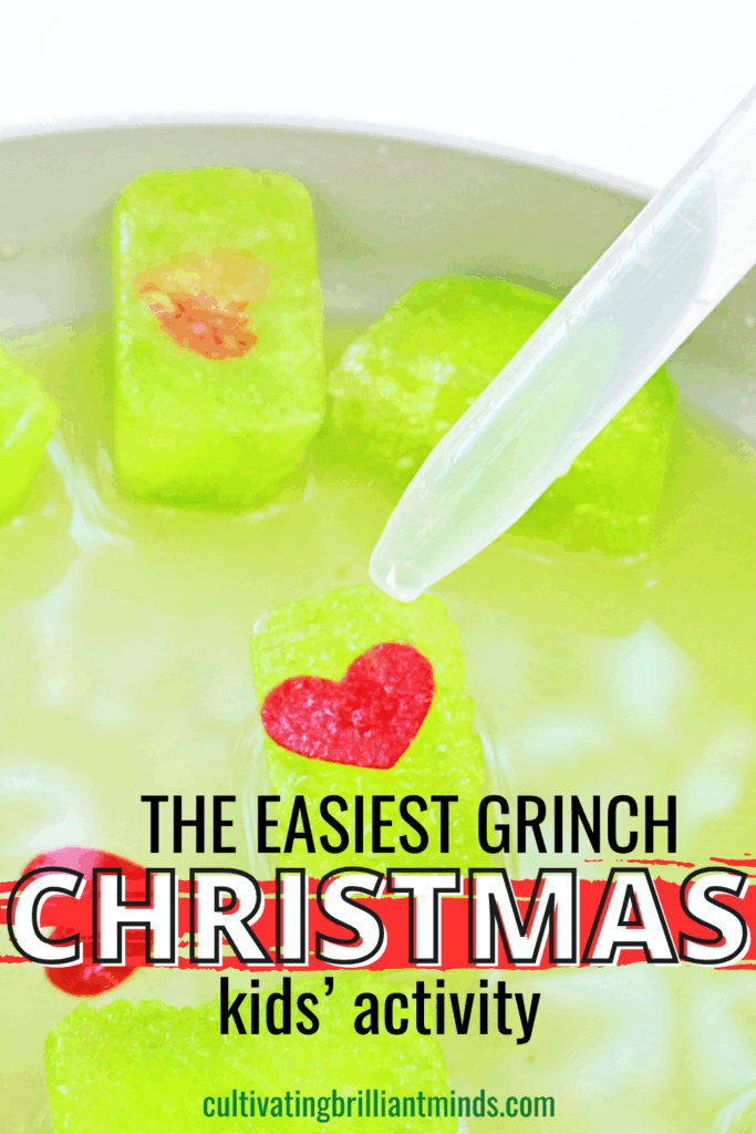 Grinch's Frozen Heart Activity - Cultivating Brilliant Minds ice cubes dyed green with a heart frozen inside