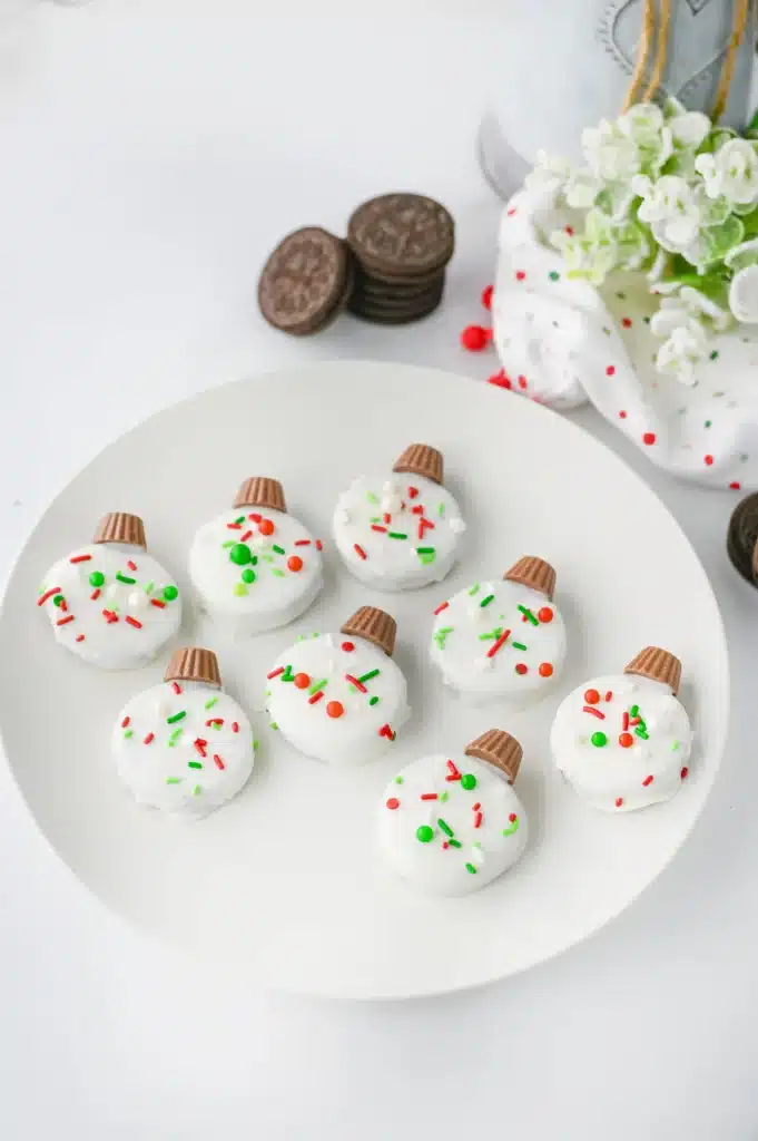 Oreo Ornament Cookies - Cultivating Brilliant Minds oreo cookies decorated to look like ornaments