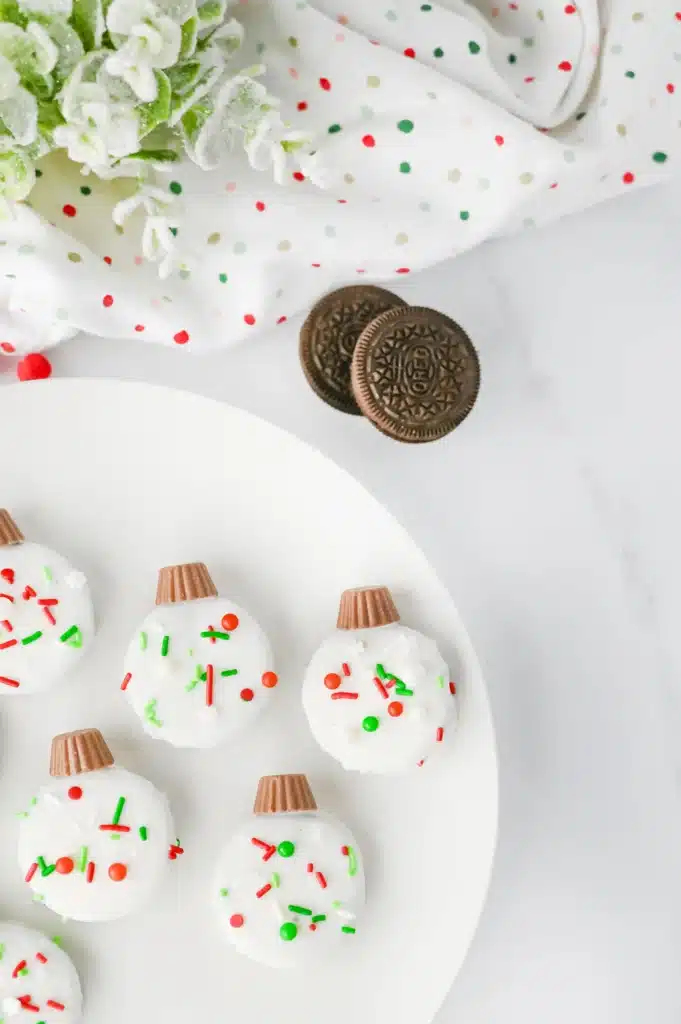 Oreo Ornament Cookies - Cultivating Brilliant Minds oreo cookies decorated to look like ornaments