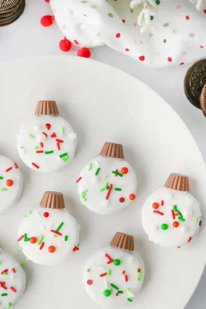 Oreo Ornament Cookies - Cultivating Brilliant Minds oreo cookies decorated to look like ornaments