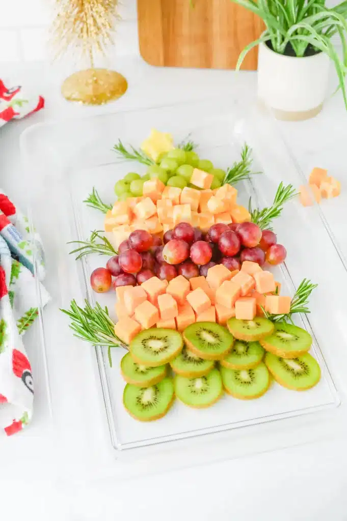 Christmas Tree Fruit Tray - Cultivating Brilliant Minds fruit on a tray arranged to look like a christmas tree