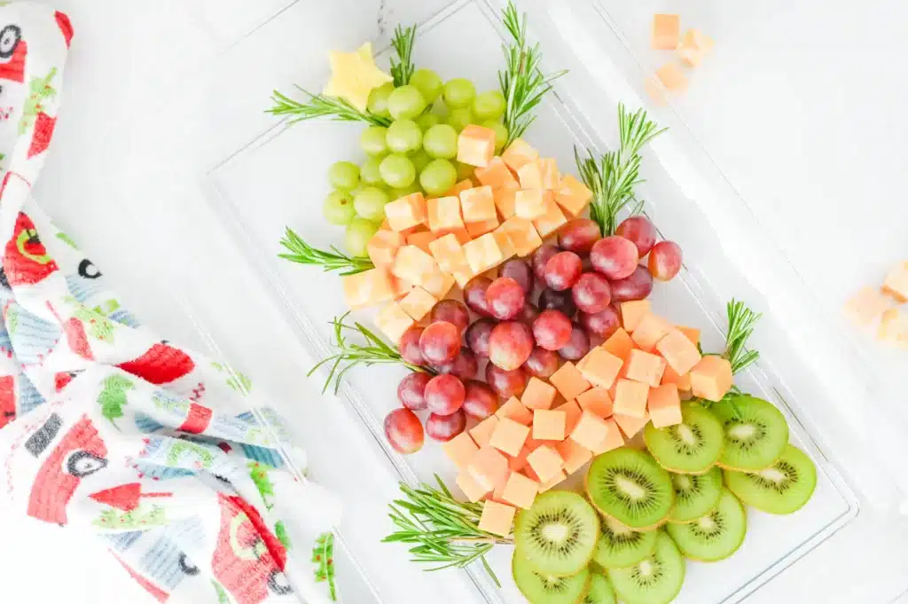 Christmas Tree Fruit Tray - Cultivating Brilliant Minds fruit on a tray arranged to look like a christmas tree
