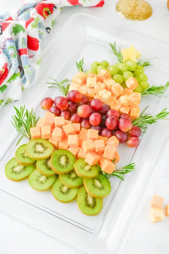 Christmas Tree Fruit Tray - Cultivating Brilliant Minds fruit on a tray arranged to look like a christmas tree