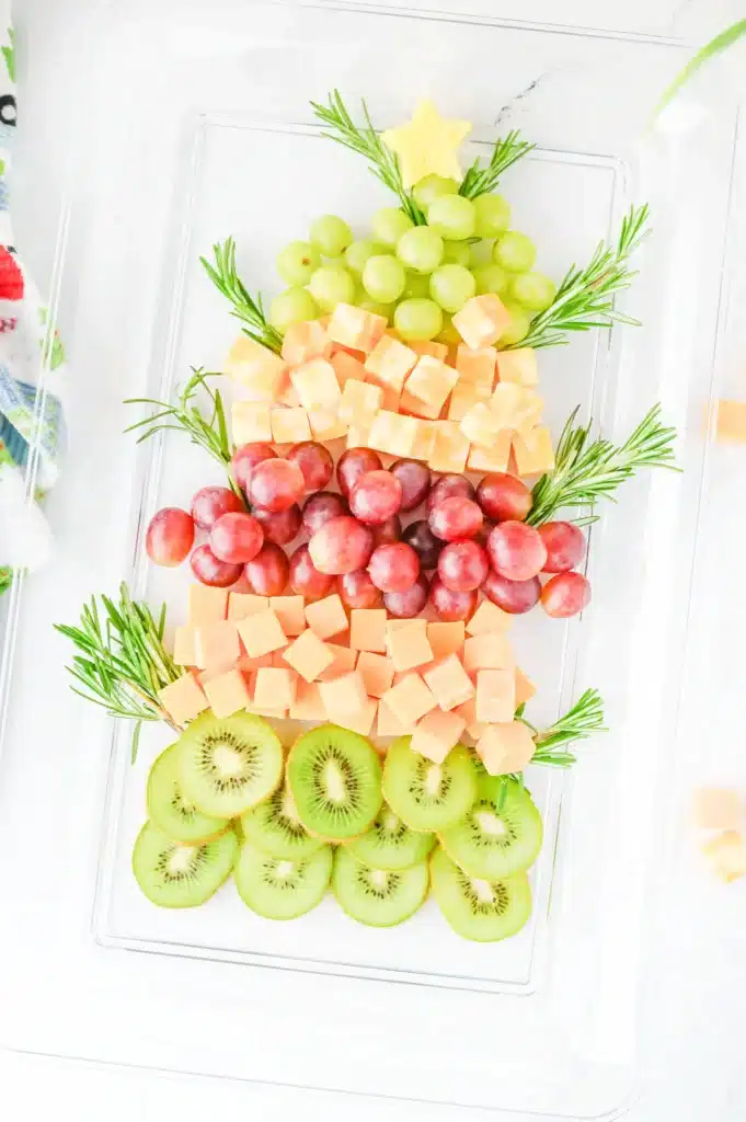 Christmas Tree Fruit Tray - Cultivating Brilliant Minds fruit on a tray arranged to look like a christmas tree