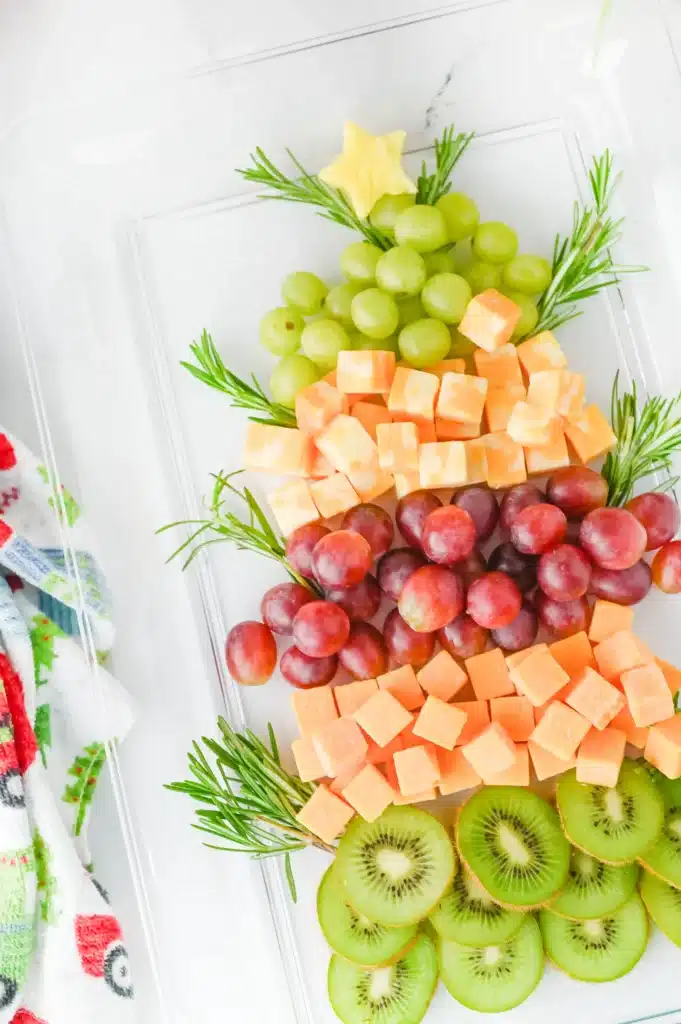 Christmas Tree Fruit Tray - Cultivating Brilliant Minds fruit on a tray arranged to look like a christmas tree