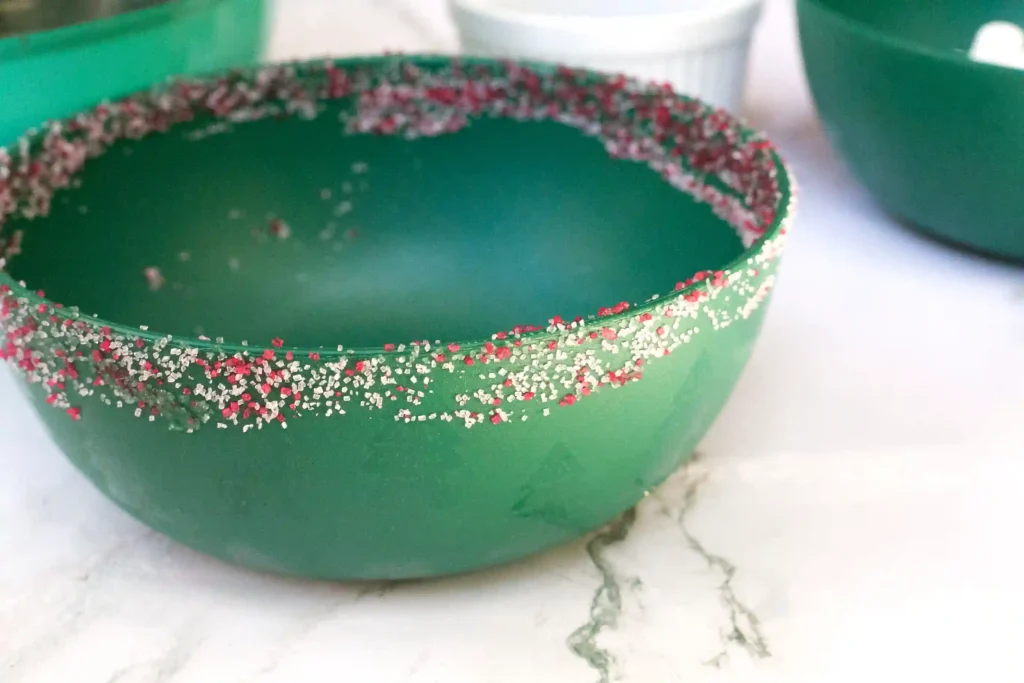 Hot Cocoa Dip - Cultivating Brilliant Minds green bowl with sprinkles around the rim