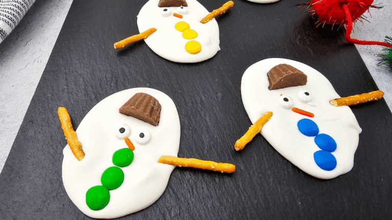 White chocolate bark decorated to look like melted snowmen