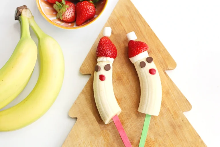 bananas with strawberry hats made to look like Santa