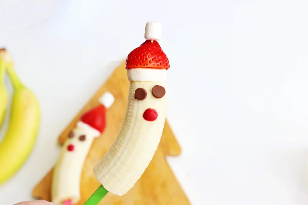 Banana Santa: A Healthy Christmas Snack - Cultivating Brilliant Minds bananas with strawberry hats made to look like Santa