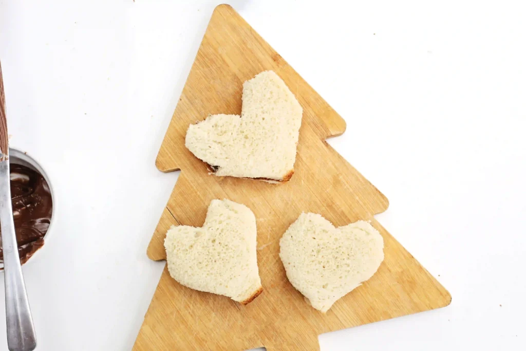 Nutella Reindeer Sandwiches - Cultivating Brilliant Minds sandwiches cut into hearts