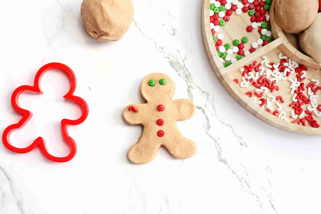 Holiday Cookie Playdough Bakery Tray - Cultivating Brilliant Minds gingerbread cookie made out of playdough