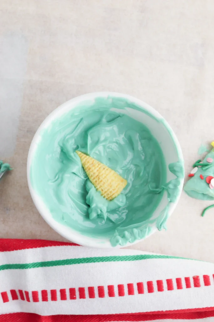 Christmas Tree Bugles - Cultivating Brilliant Minds a bugle in green melted candy melts