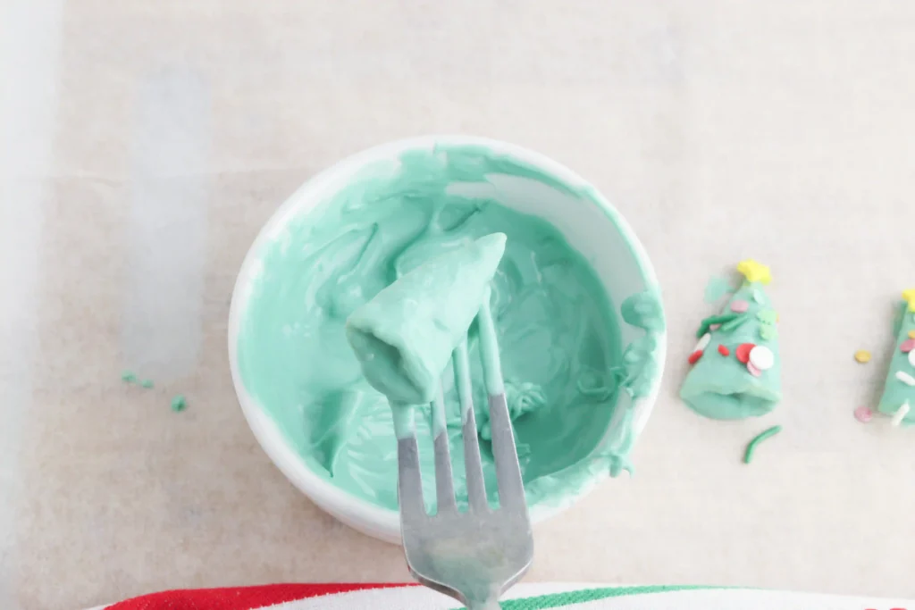 Christmas Tree Bugles - Cultivating Brilliant Minds a bugle in green melted candy melts