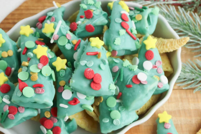 bugles covered in green melted chocolate and sprinkles to look like christmas trees