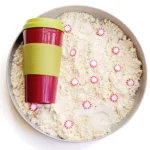 Peppermint Latte Cloud Dough Tray - Cultivating Brilliant Minds a cloud dough tray filled with peppermints