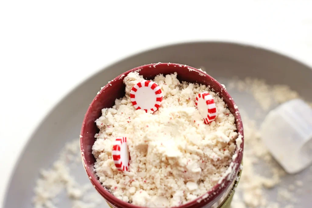 Peppermint Latte Cloud Dough Tray - Cultivating Brilliant Minds a cloud dough tray filled with peppermints