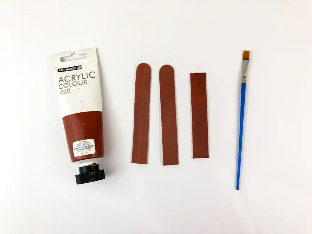 Reindeer Popsicle Stick Ornament Craft - Cultivating Brilliant Minds popsicle sticks painted brown