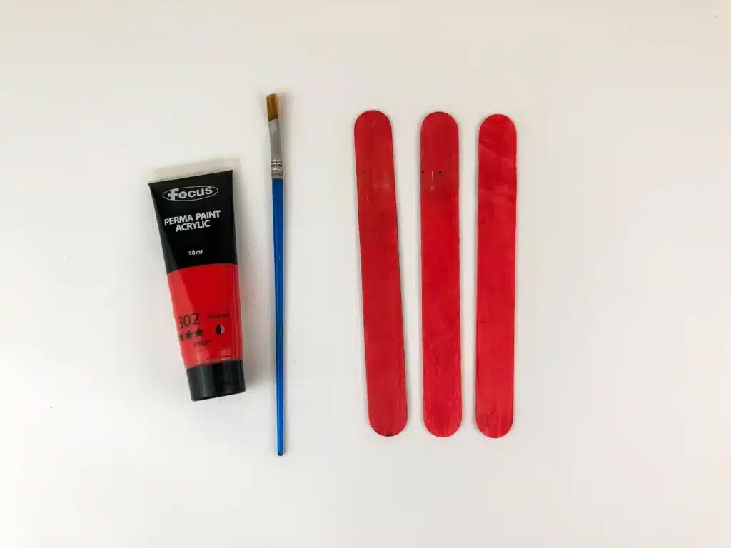 Santa Popsicle Stick Ornament Craft - Cultivating Brilliant Minds popsicle sticks painted red