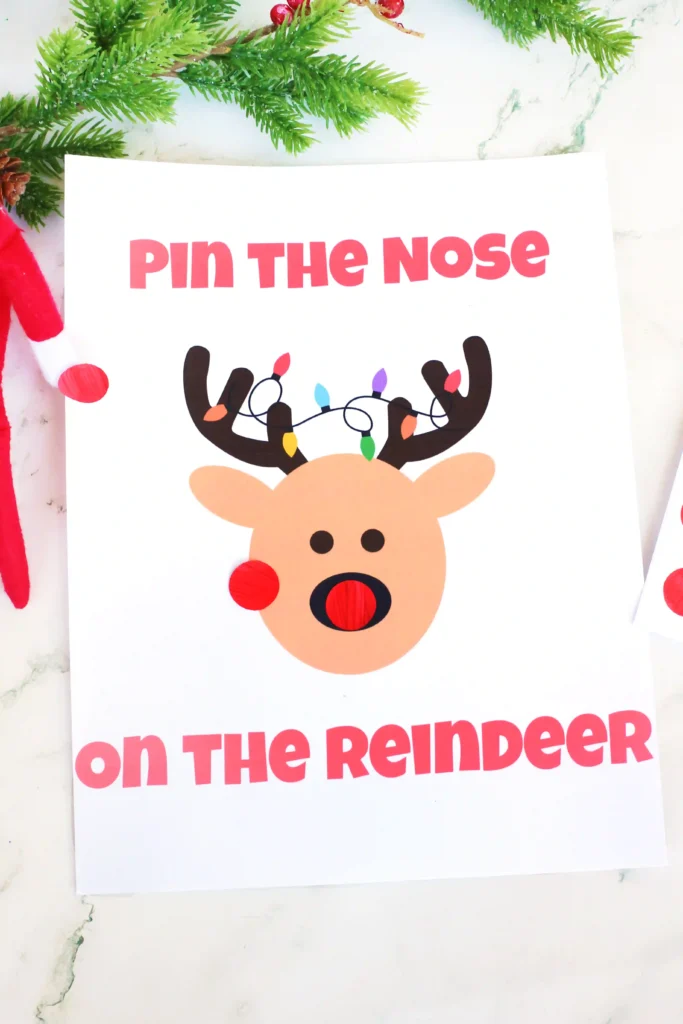 Pin the Nose on the Reindeer - Cultivating Brilliant Minds a sign that reads "pin the nose on the reindeer"