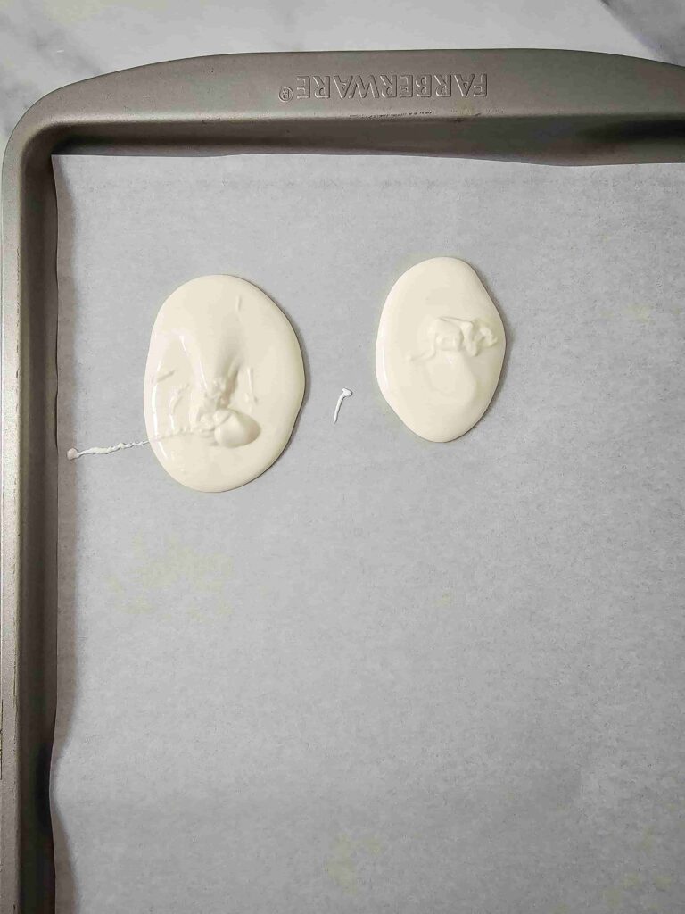 Melted Snowman Chocolate Bark - Cultivating Brilliant Minds melted white chocolate