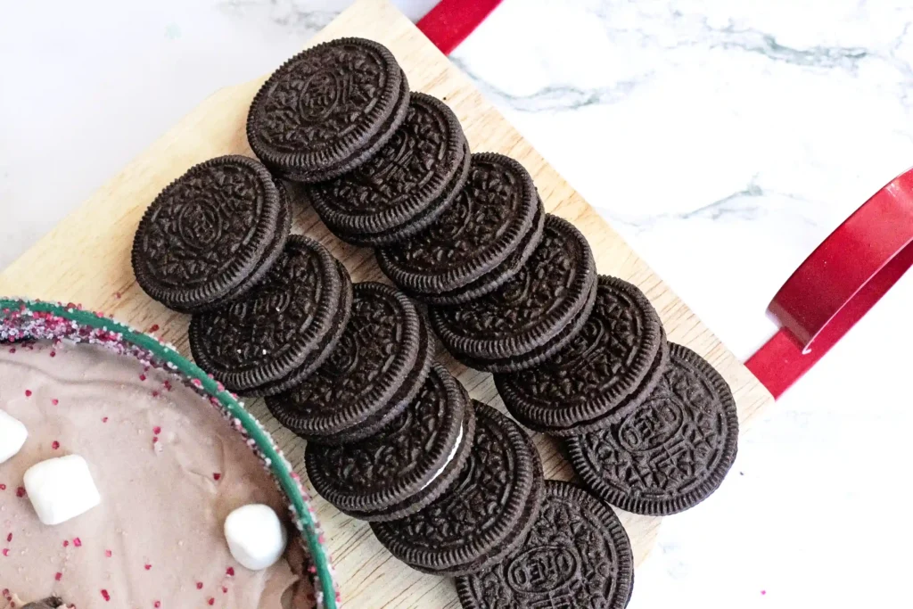 Hot Cocoa Dip - Cultivating Brilliant Minds oreos next to the hot cocoa dip