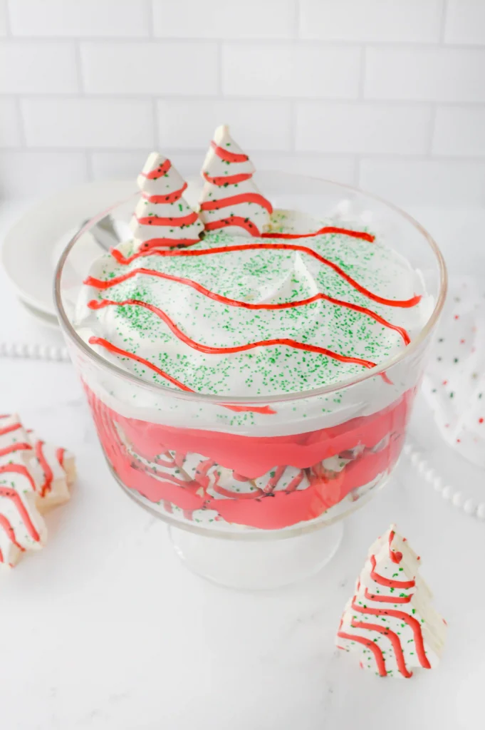 Christmas Tree Cake Trifle - Cultivating Brilliant Minds a christmas tree trifle in a glass trifle jar