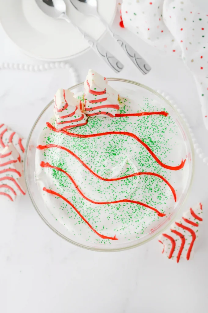 Christmas Tree Cake Trifle - Cultivating Brilliant Minds a christmas tree trifle in a glass trifle jar