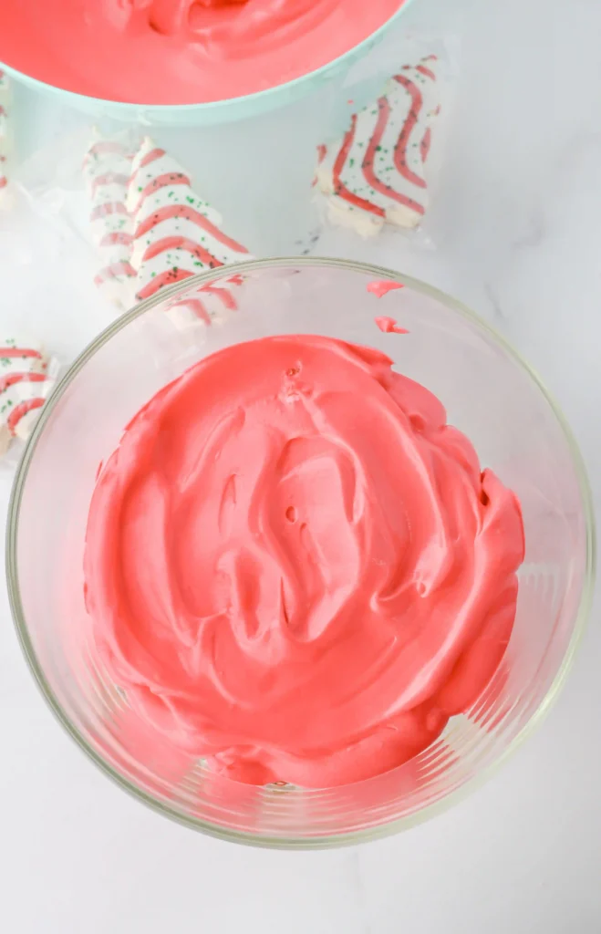 Christmas Tree Cake Trifle - Cultivating Brilliant Minds layer of the red pudding mix in the trifle jar