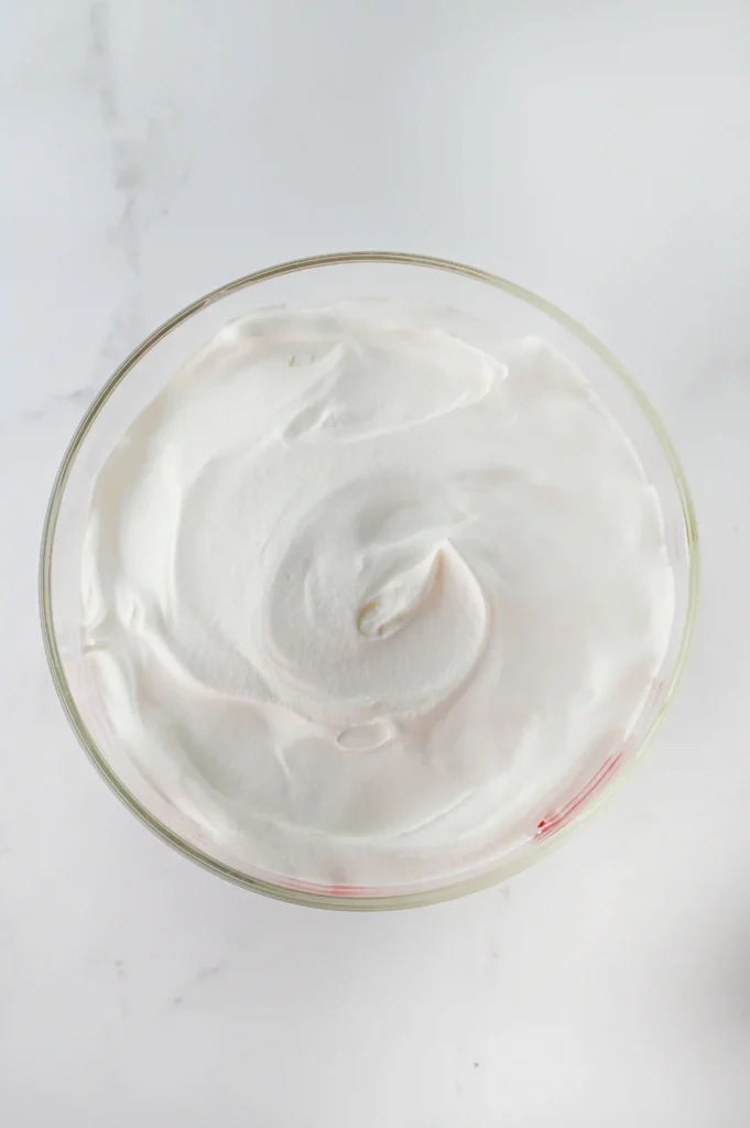 Christmas Tree Cake Trifle - Cultivating Brilliant Minds cool whip spread over the trifle