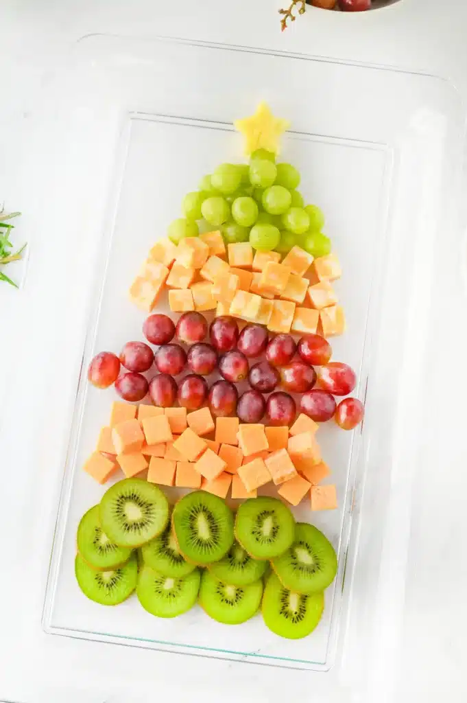 Christmas Tree Fruit Tray - Cultivating Brilliant Minds fruit on a tray arranged to look like a christmas tree