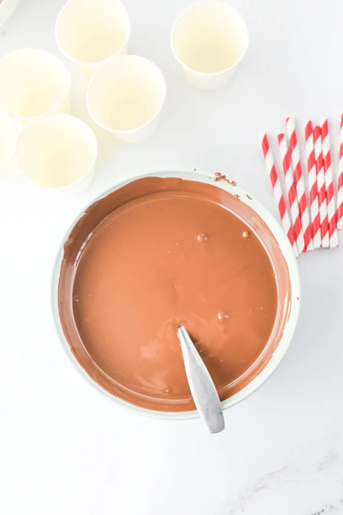 Hot Chocolate Sticks - Cultivating Brilliant Minds melted chocolate in a bowl