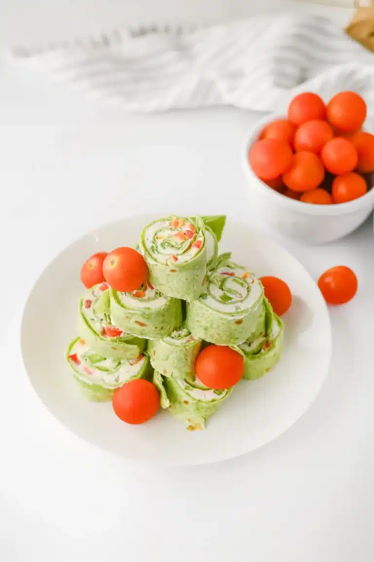 christmas pinwheels decorated with cherry tomatoes