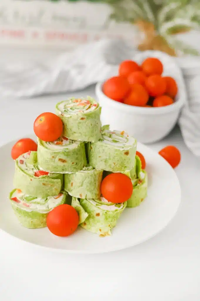 Christmas Pinwheels - Cultivating Brilliant Minds christmas pinwheels decorated with cherry tomatoes