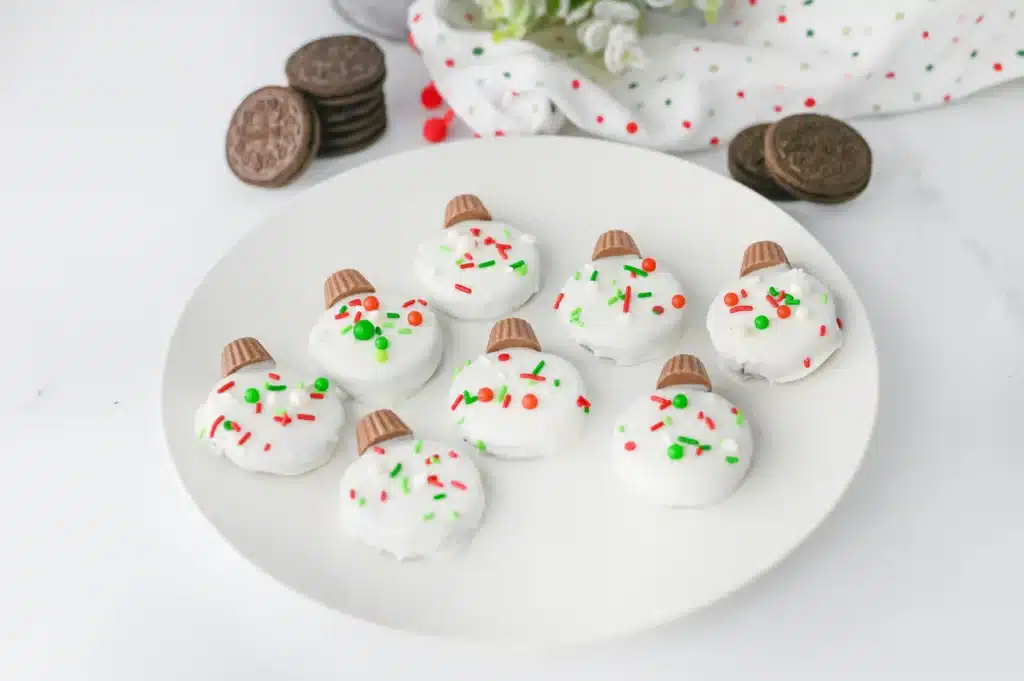 Oreo Ornament Cookies - Cultivating Brilliant Minds oreo cookies decorated to look like ornaments