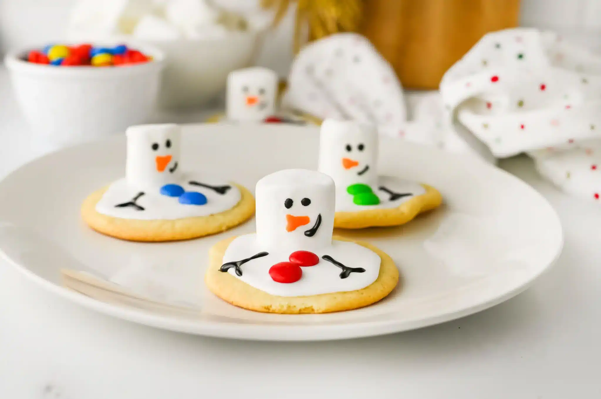 cookies decorated to look like melted snowmen