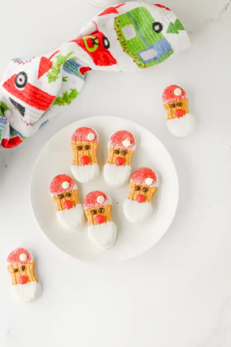 nutter butters decorated to look like Santa