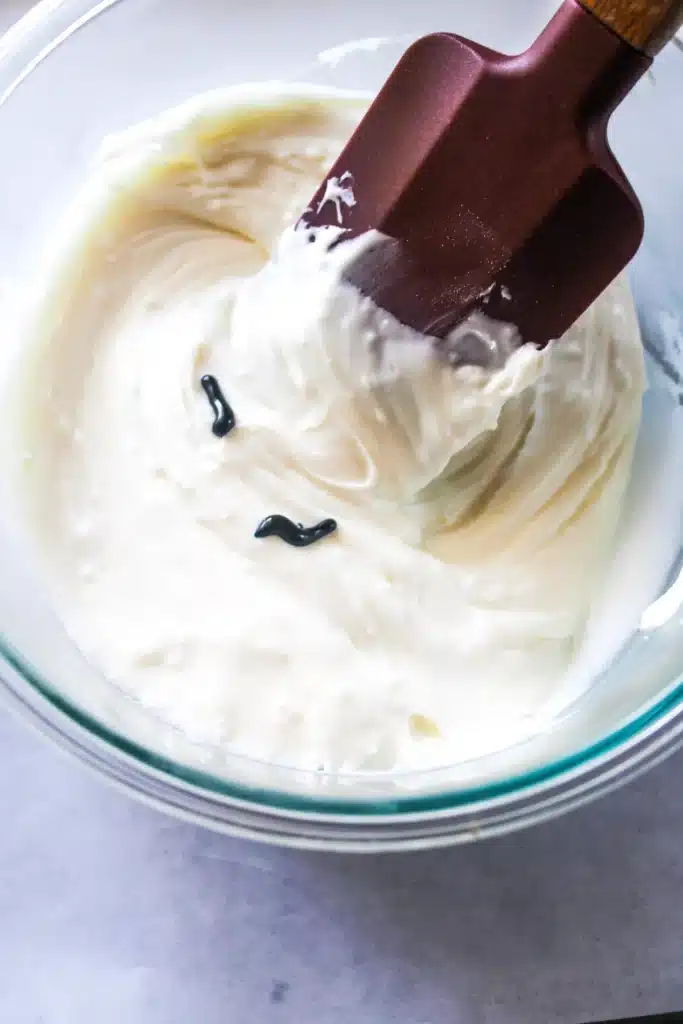 Snowglobe Bark - Cultivating Brilliant Minds melted chocolate in a bowl