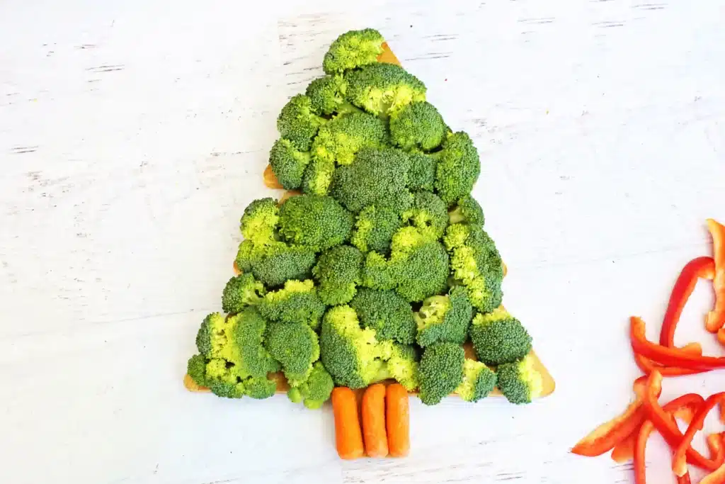 Christmas Tree Veggie Tray - Cultivating Brilliant Minds a christmas tree made out of broccoli and carrots