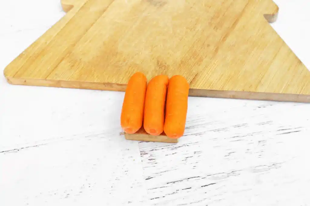 Christmas Tree Veggie Tray - Cultivating Brilliant Minds carrots on a wooden cutting board