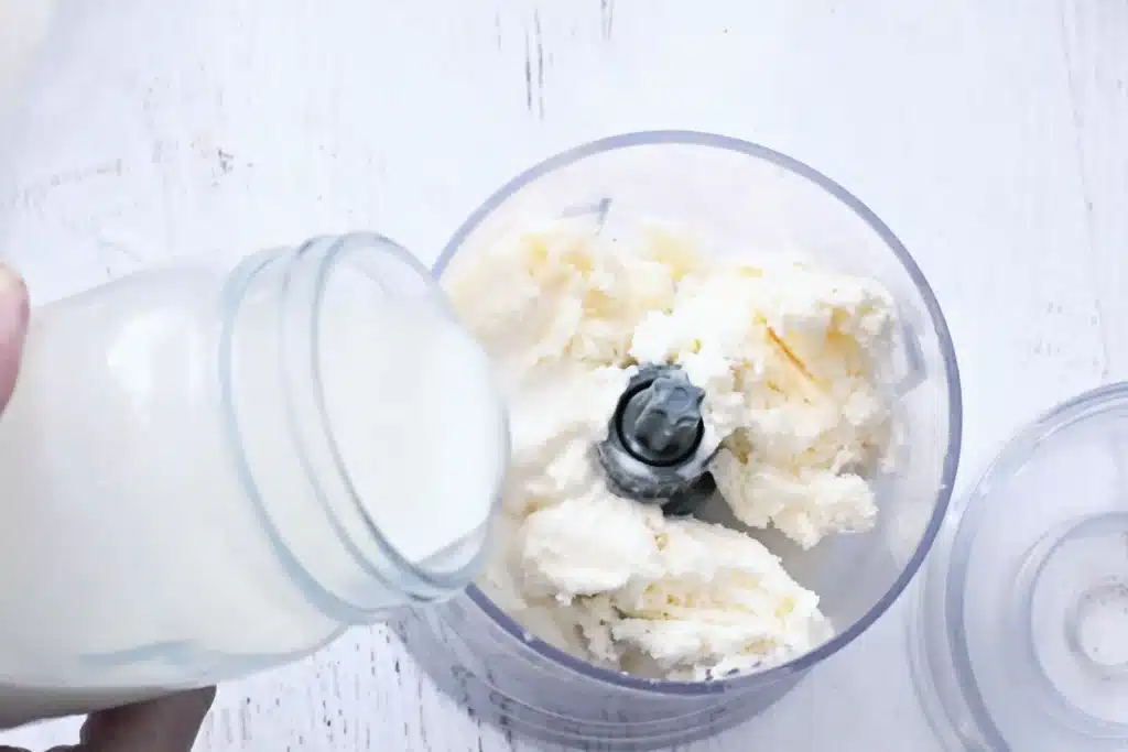 Christmas Tree Cake Milkshake - Cultivating Brilliant Minds vanilla ice cream and milk in a blender