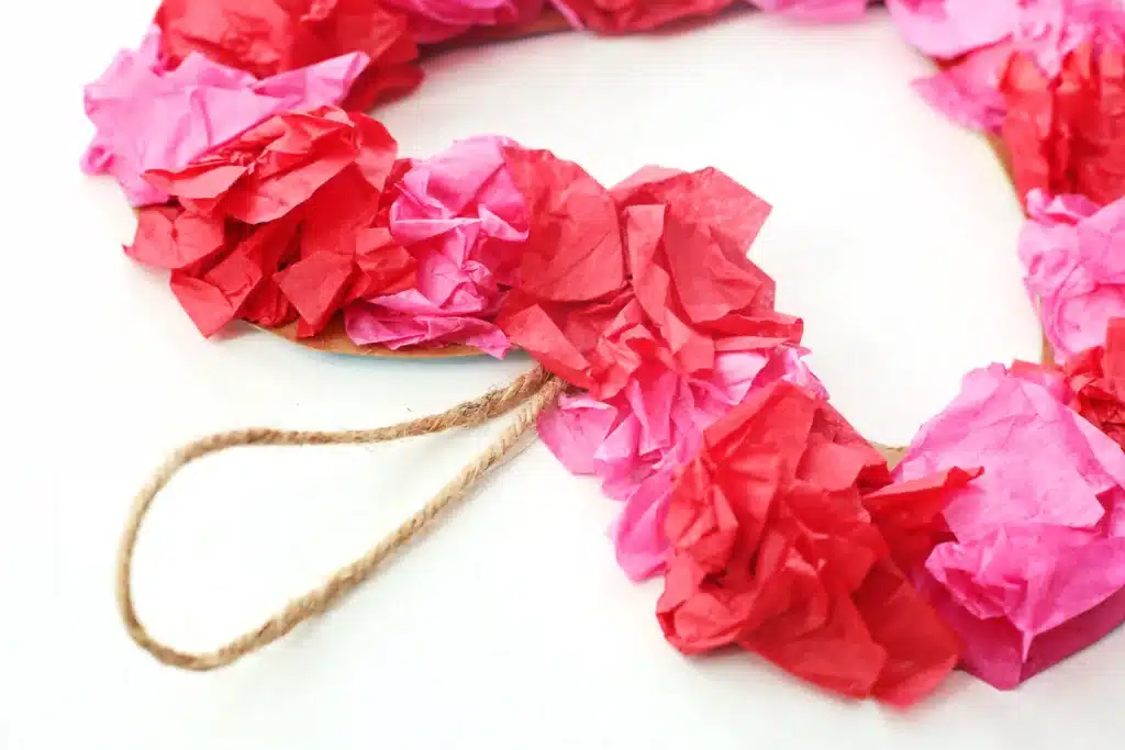 Tissue Paper Heart Wreath - Cultivating Brilliant Minds a heart wreath made out of tissue paper
