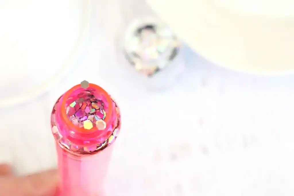 Candy Cane Sensory Wand - Cultivating Brilliant Minds glitter inside a bubble wand
