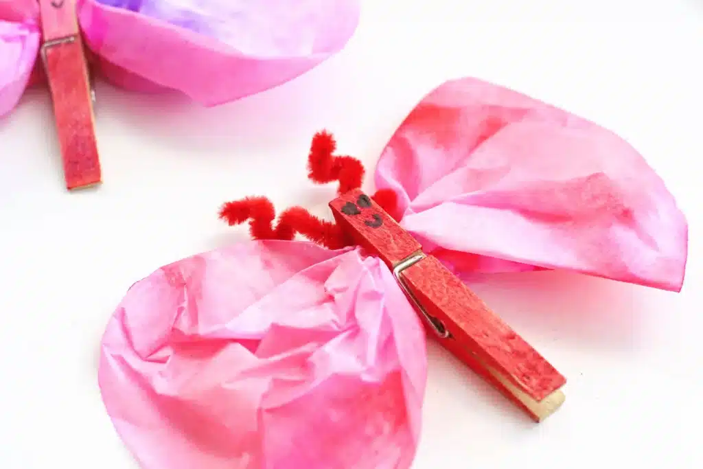 Coffee Filter Valentine Love Bugs - Cultivating Brilliant Minds valentine love bugs made using coffee filters and clothespins